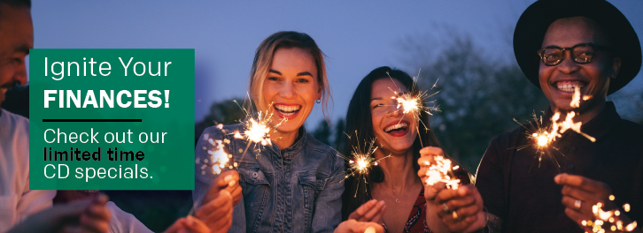 Diverse group holding sparklers - Ignite your Finances, check out our limited time CD specials.